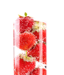 Glass with strawberries isolated