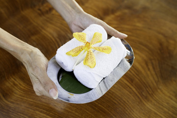 Roll up white spa towels