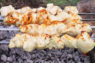 Shish kebab on the improvised oven made of brick