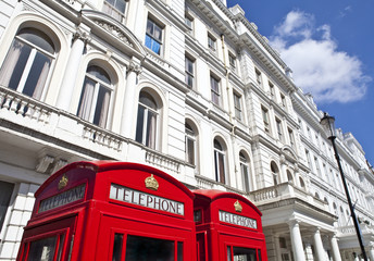 Red Telephone Boxes outside Attractive London Appartments