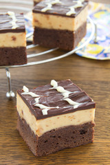 Brownies with peanuts and chocolate.