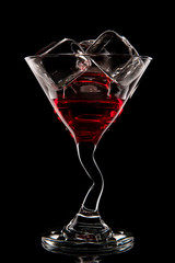 Red cocktail. Liquor, martini or cosmopolitan.
