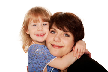 Mother and little daughter hugging.