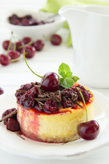 Cheesecake with cherries and chocolate.