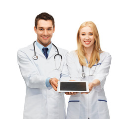 young doctors showing tablet pc