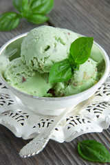 Green ice cream with basil, mint and nuts.
