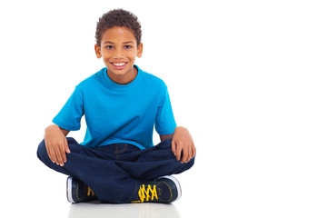 african american boy sitting on white background - Powered by Adobe