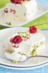 Yoghurt Semifreddo with raspberry and pistachio.