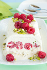 Yoghurt Semifreddo with raspberry and pistachio.