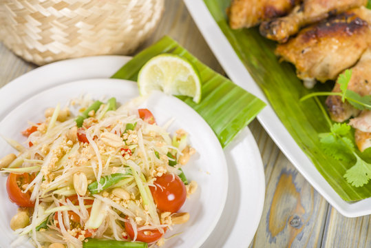 Som Tam  Kai Yang - Green Papaya Salad & BBQ Chicken.