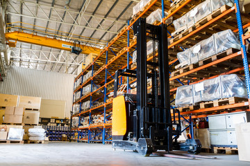 Modern warehouse with forklifts