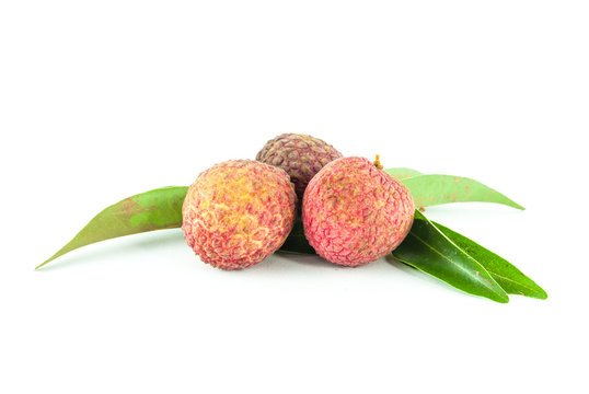 Lychee with leaves on a white background