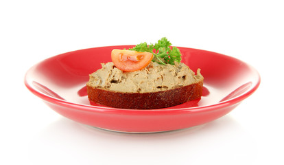 Toasted bread with pate on color plate, isolated on white