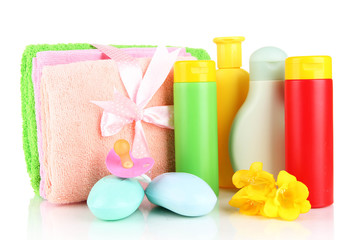 Baby cosmetics, towels and soap, isolated on white