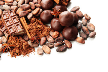 Composition of chocolate sweets, cocoa and spices, isolated