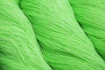 Rolls of green polyester rope - close up