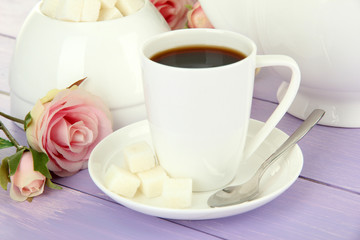 Cup of coffee, on color wooden background