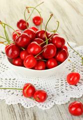Cherry berries on wooden table close up