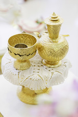 Fototapeta na wymiar Golden bowl in Thai style