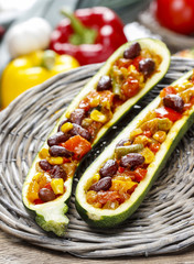 Zucchini stuffed with vegetable salad