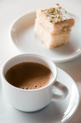 Coffee and a slice of biscuit