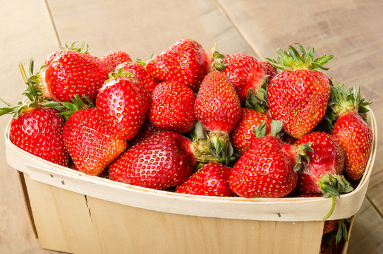 Freshly picked strawberries in a basket