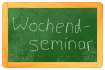 Obraz premium Wochenendseminar auf einer Tafel
