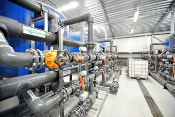 Photo sur Plexiglas Bâtiment industriel new plastic pipes in industrial boiler room