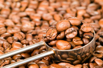 Coffee beans background with spoon
