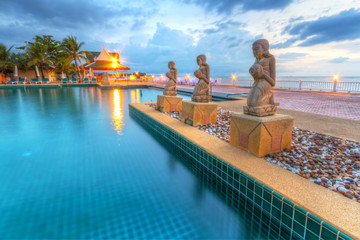 Sunset at swimming pool in Thailand