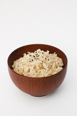 Brown rice in wooden bowl