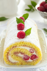 Roulade with raspberries and cream.
