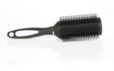 Black Hairbrush on White with Reflection