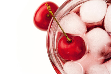 Cherry cocktail top view on white blank