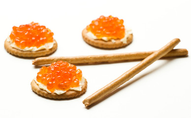 red caviar on a cracker