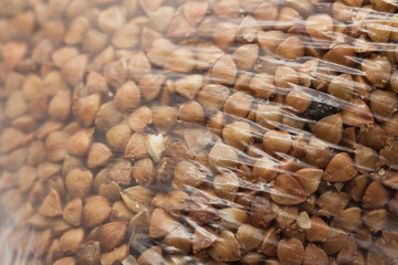 Obraz premium buckwheat in a plastic bag