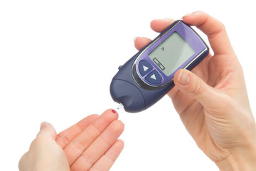 Diabetes patient measuring glucose level blood test