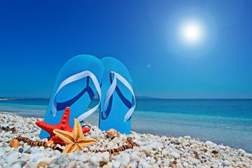 blue sandals and sun