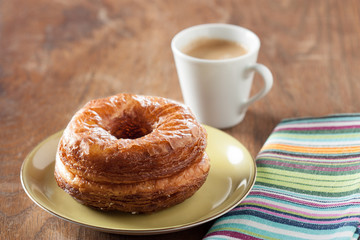 Croissant and doughnut mixture on a dish