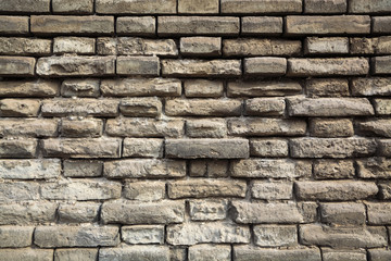 weathered grey bricks wall