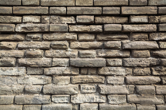 Fototapeta weathered grey bricks wall