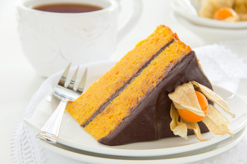 Pumpkin cake with chocolate cream.