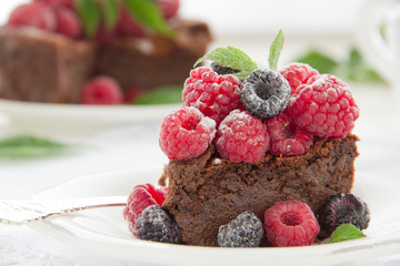 Chocolate mousse cake with raspberries.