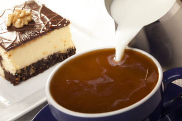 Cheesecak with a cap of coffee 