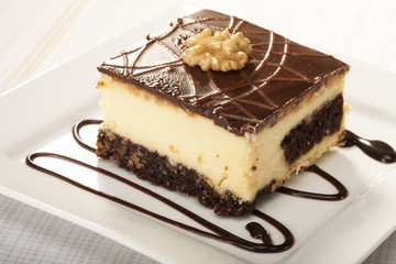 Cheesecak with a cap of coffee 