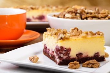 Cheesecak with a cap of coffee or tea 