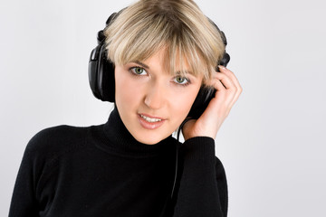 Close-up of a beautiful girl with headphones