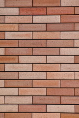 New red brick wall as background closeup