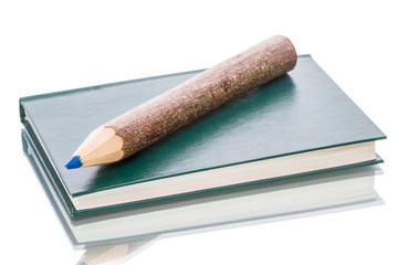 Notebook and a large pencil