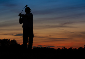 Golfing silhouette